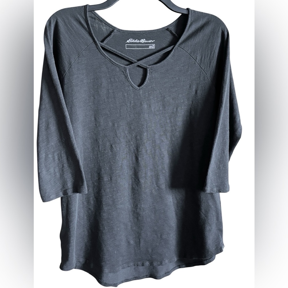 Women's size medium Eddie Bauer 3/4-sleeve cross-front tunic in black.